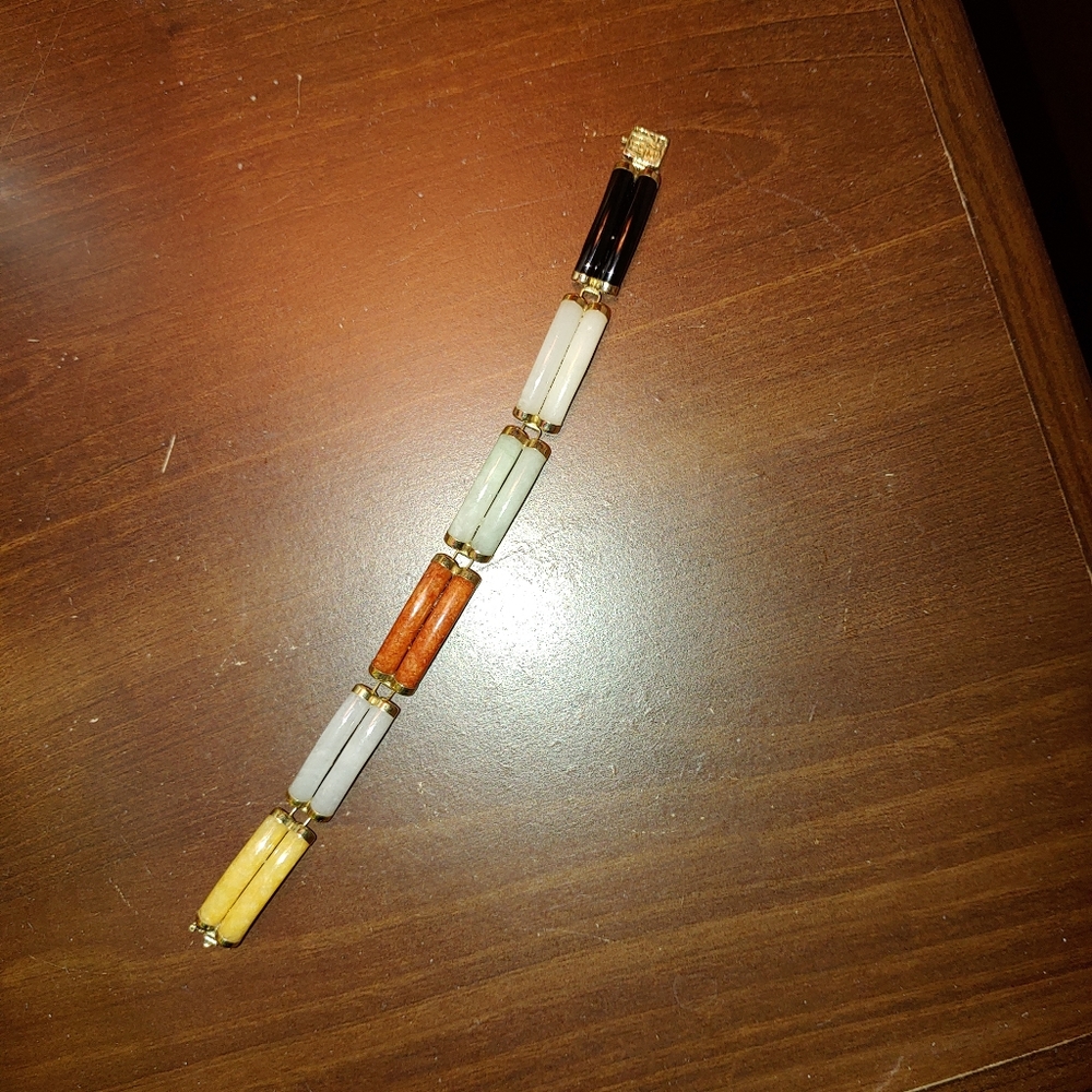 Jade and gold bracelet